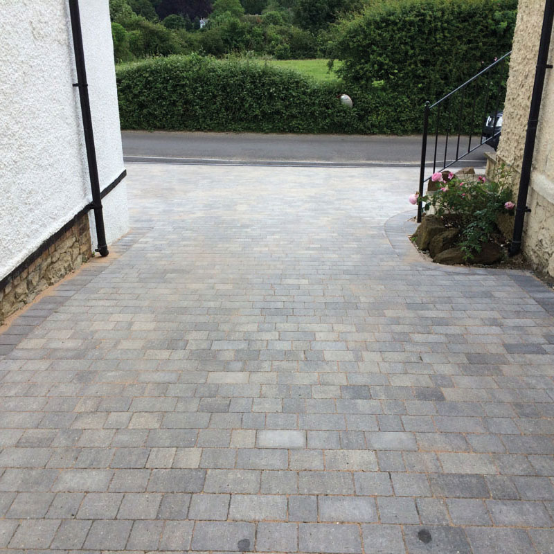 Driveway paving image with modern block paving and a neat residential approach.